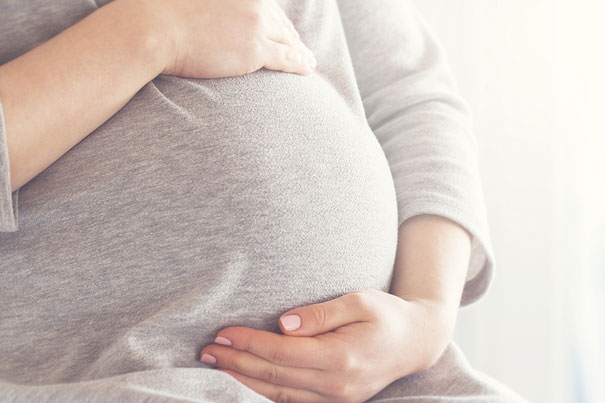 Expectant mother attending pregnancy consultation